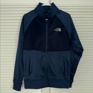 The North Face Blue Performance Jacket with Two-Tone Design